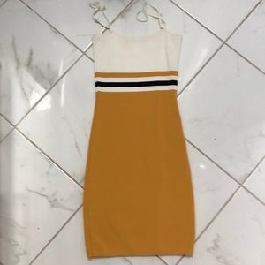 “He Doesn’t Know Why” yellow bodycon dress